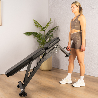 Photograph of a model moving the UB70 with the transport wheels