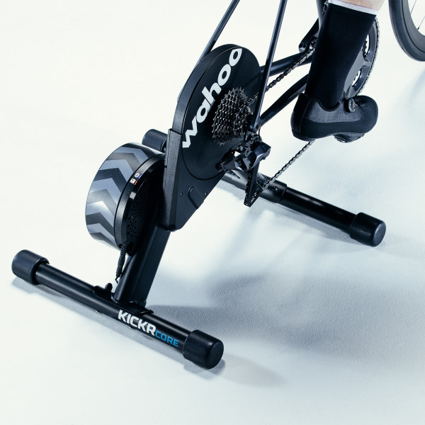 Close-up of a cyclist using the Wahoo KICKR CORE Smart Bike Trainer.