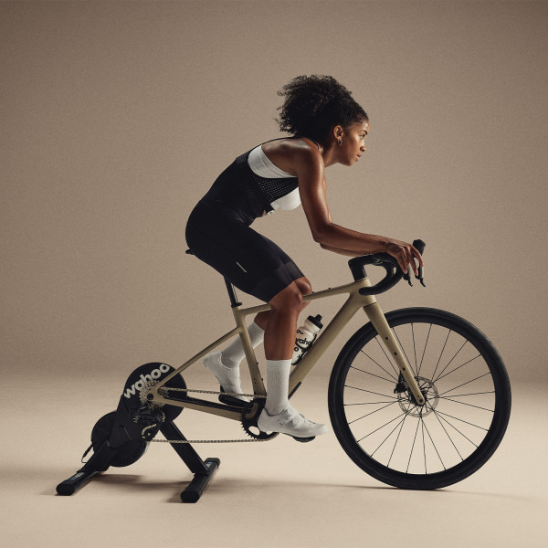 Person in riding position on the Wahoo KICKR CORE 2 trainer