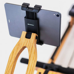 Tablet mounted in the WaterRower tablet holder on the rowing machine