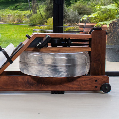 Side view of the WaterRower Original Series water tank and flywheel